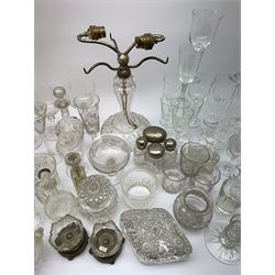 A number of Victorian tumblers and Edwardian drinking glasses, together with a large quantity of other later glassware, to include a glass table lamp base, drinking glasses of various forms, a number with cut decoration, other assorted cut glass including jug, vases, jars and covers, etc. 