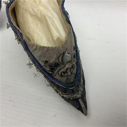 Pair of Chinese silk embroidered lotus shoes, for bound feet, a blue ground with floral detailing L15cm