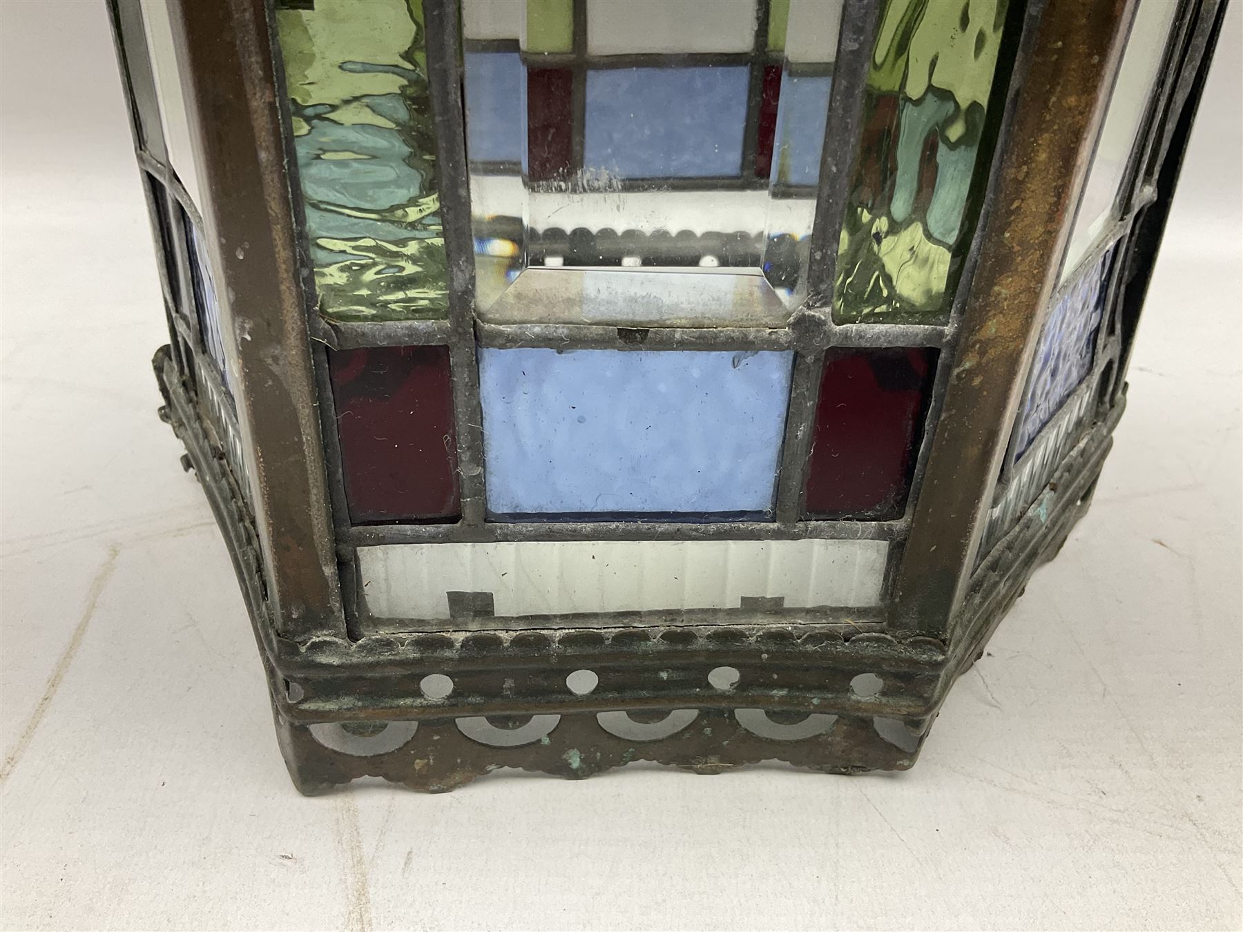 Victorian brass and stained leaded glass hall lantern, of hexagonal form, supported by four domed arms and pierced fret, H46cm W20cm