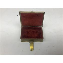 Collection of victorian and later brass desk accessories, to include a letter holder with cherub design, ink well of square form with hinged lid, brass table bell, brass casket with relief decoration, etc  