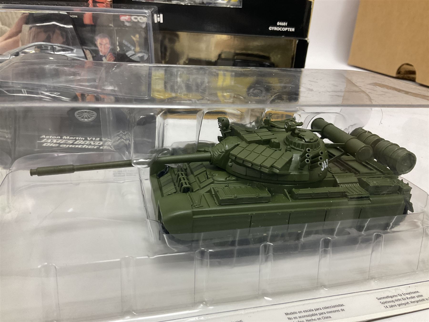 Corgi - The Definitive Bond Collection and The Director's Cut - nine die-cast vehicles from You Only Live Twice, Goldfinger, For Your Eyes Only, Diamonds Are Forever etc; Corgi Classics Moonraker Shuttle and Lotus Esprit; two other Corgi James Bond packs; Carrera Die Another Day Aston Martin V12 Vanquish; nine Johnny Lightning carded James Bond vehicles; Dragon carded Wai Lin figure; and three Fabbri tanks; all boxed/packaged (27)