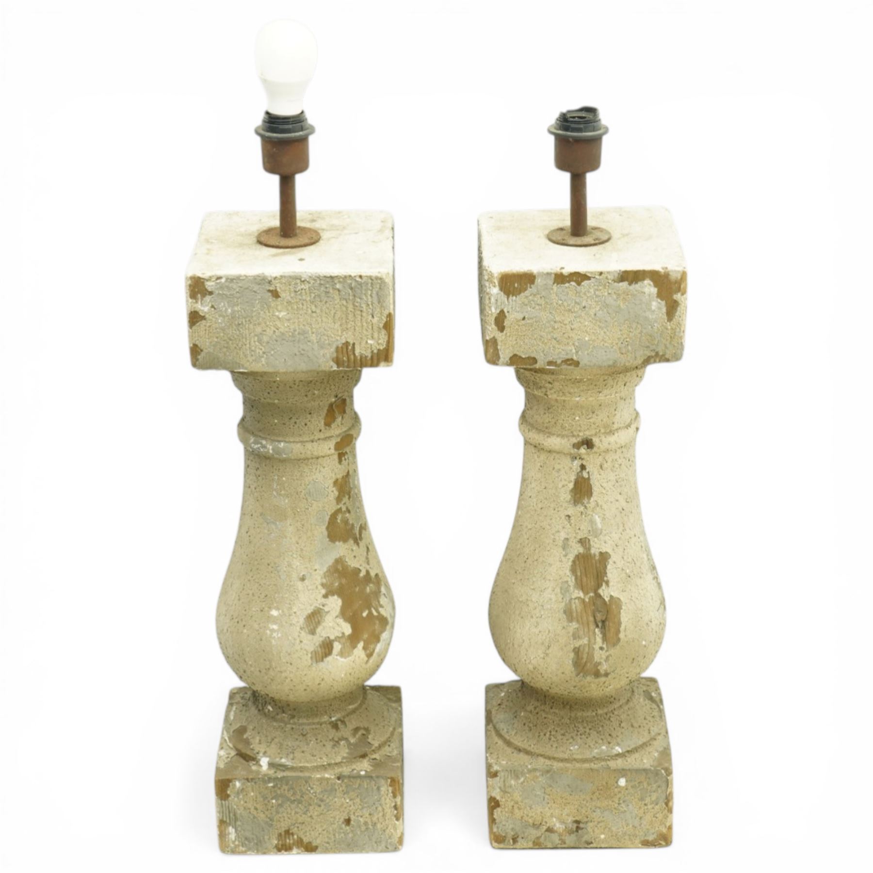 Pair of late 20th century pine table lamps, each of architectural column form, with square capital over turned baluster support and plinth base, distressed stone effect painted finish