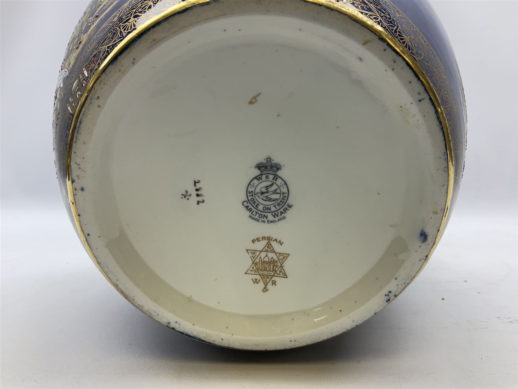Carlton Ware Persian pattern ginger jar and cover decorated with an enamel and gilt Chinoiserie landscape with figures beside a pagoda upon a blue ground, with printed mark beneath, H27cm