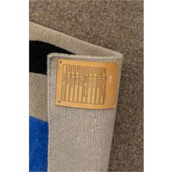 Rugs by Design - ‘Soft Landing’ Nepalese thick pile wool rug, with contemporary abstract design on a taupe ground, decorated with rounded blue forms and a bold black irregular loop motif