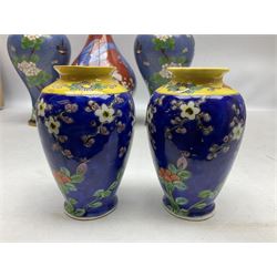 20th Century Japanese vase decorated with a blue dragon and gilding upon red yellow ground, bears Fukagawa Seiji mark (a/f), together with pair of blue cloisonné vases of baluster form decorated with blossom, and pair of Japanese vases, tallest H26cm