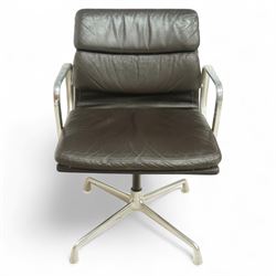 Charles and Ray Eames for Herman Miller - 1970s soft pad office chair model 'EA 207', low back and seat upholstered in chocolate brown leather flanked by open aluminium arms, raised on a non-swivelling aluminium base with manual screw adjustment function