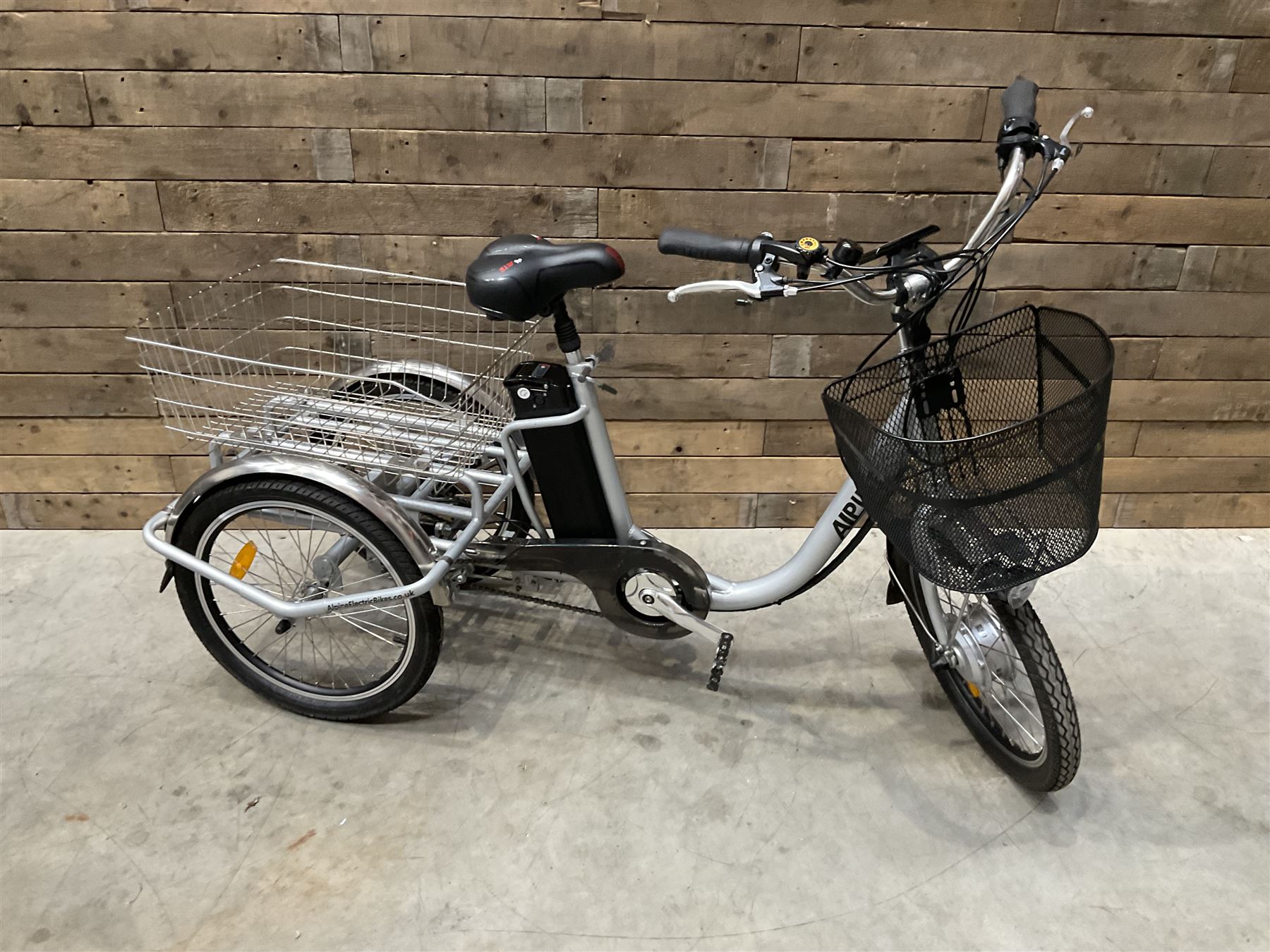 Alpine electric tilt trike - power assisted with throttle (no need to pedal), 15.5mph with 40 mile range, only 37 miles from new, silver finish, removable battery with charger, YoungDo gell seat with cover, £2749 new.