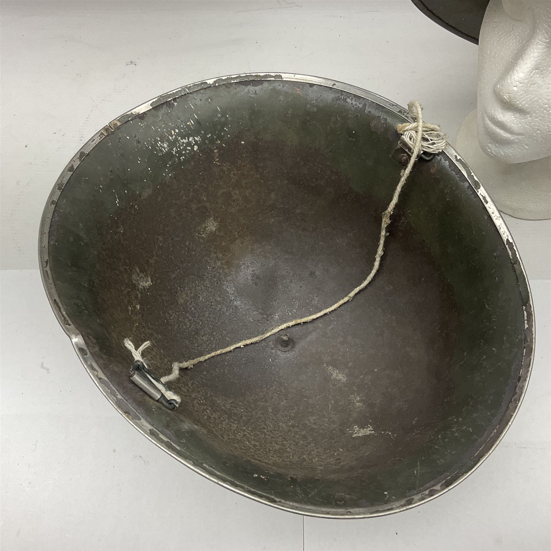 Two air force jackets, together with two helmets and Bamberger Mutzen Industrie German military hat and two others 