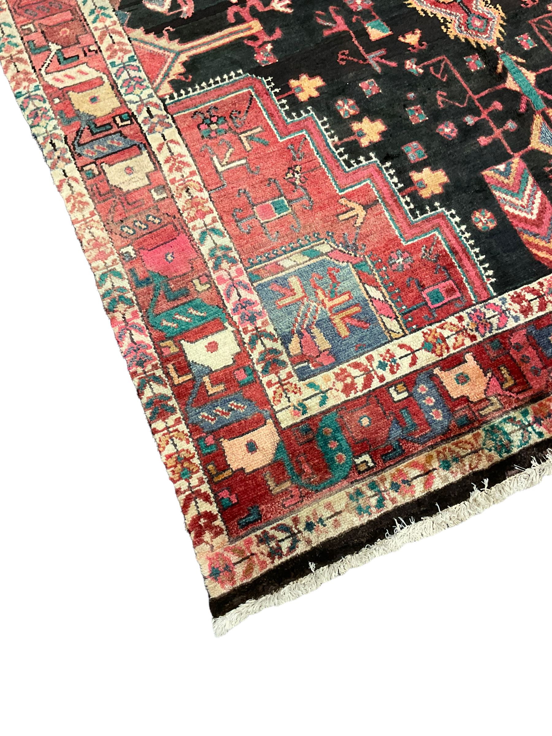 Persian Hamadan rug, the field decorated allover with stylised plant