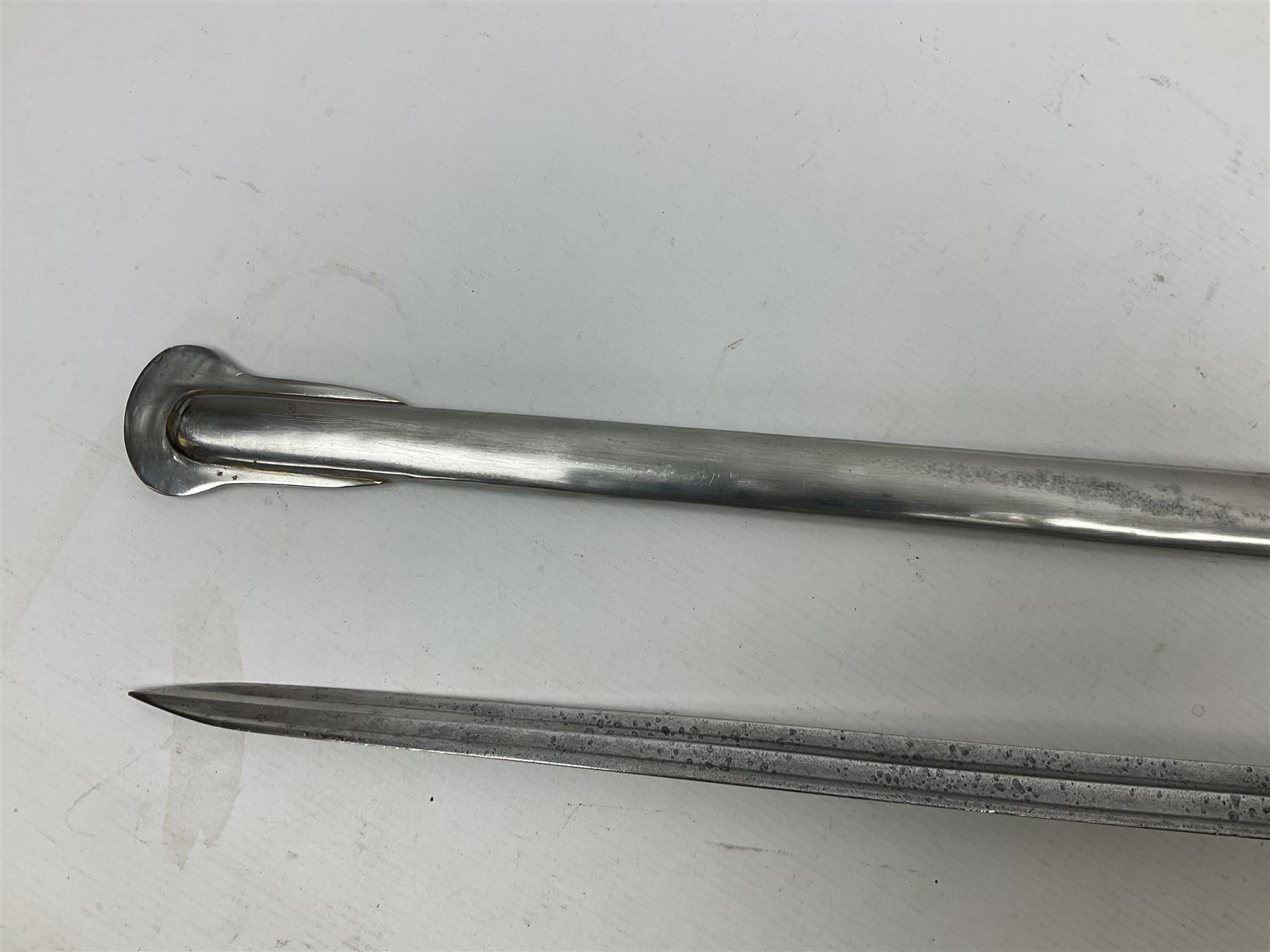 Early 19c French 1st Empire Heavy Cavalry trooper's sword, the 95.5cm double fullered blade with various stamped marks and inscribed Klingenthal 1814 to the back edge, four-bar brass hilt with wire-bound leather grip, knucklebow numbered 139; in polished steel scabbard with two suspension rings L117cm overall