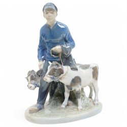 Three Royal Copenhagen figures, including Boy leading two Calves no. 1858, Boy with Calf no. 772, and Girl feeding Calf no. 779