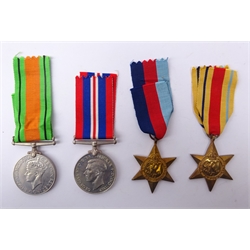  Four WW2 medals comprising 1939-45 War Medal, Defence Medal, Africa Star and 1939-45 Star in issue box with cloth badge and slip, addressed to (1101800 RAF Warrant Officer) H.E.L. Holden, Hull  