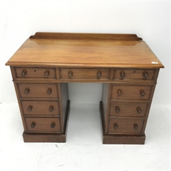 Victorian mahogany twin pedestal desk, moulded rectangular top with raised back, fitted with nine drawers, plinth base, W104cm, D80cm, D52cm
