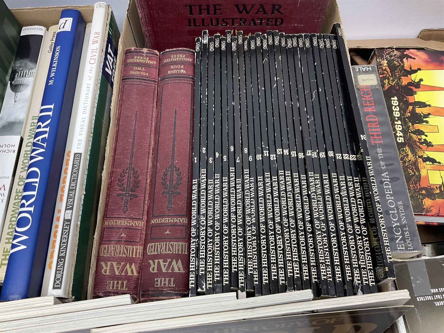 Three boxes of books, periodicals and DVDs of military interest with particular emphasis on WW2 including The History of World War Two in thirty original parts by Orbis, The D-Day Experience by Richard Holmes, The World War Two Databook, The World at War, Special Forces etc