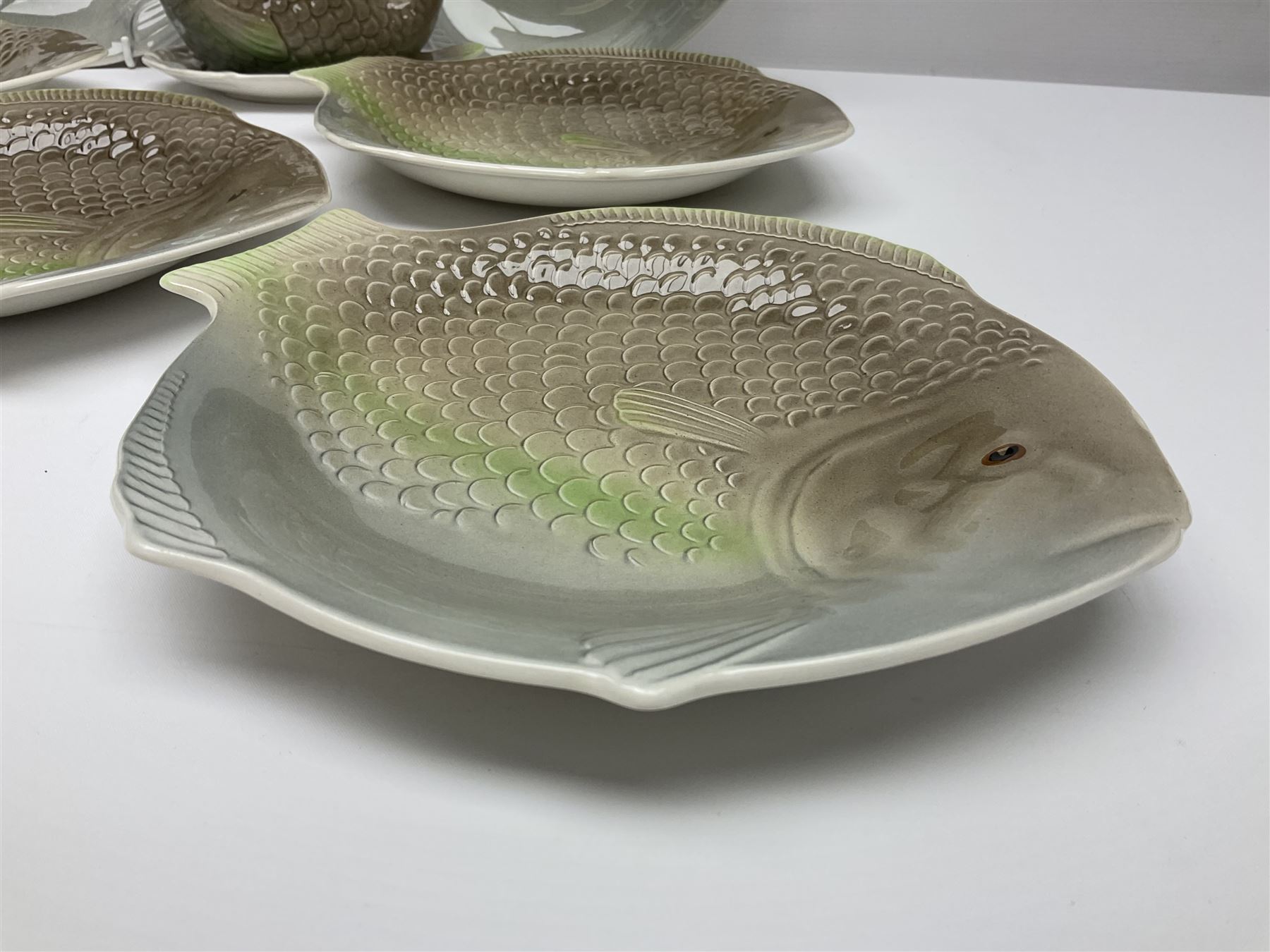 Shorter & Son six fish plates, together with a larger platter and sauce boat and saucer, all with stamped marks beneath