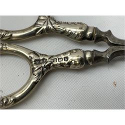 Small group of silver, to include Georgian Fiddle pattern teaspoon, later teaspoon, sugar tongs, etc., all hallmarked, approximate weighable silver 59 grams, approximate gross weight 113 grams