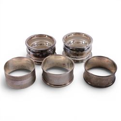 Collection of silver, including napkin rings, two vest cases, cigarette case covers and scandinavian 830 cake fork