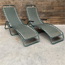 Pair metal framed folding sun loungers