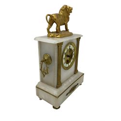 French - mid 19th century 8-day mantle clock in an alabaster case with a flat top surmounted by a gilded roaring lion, with side handles and ionic pilasters to the front, two part dial with a  recessed gilt centre, enamel chapter, Arabic numerals and spade hands, timepiece movement with pendulum and key.