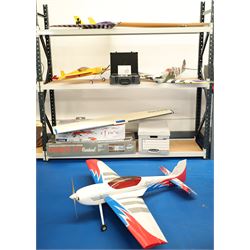 A collection of Remote control airplanes and helicopters; comprising four airplane built m...