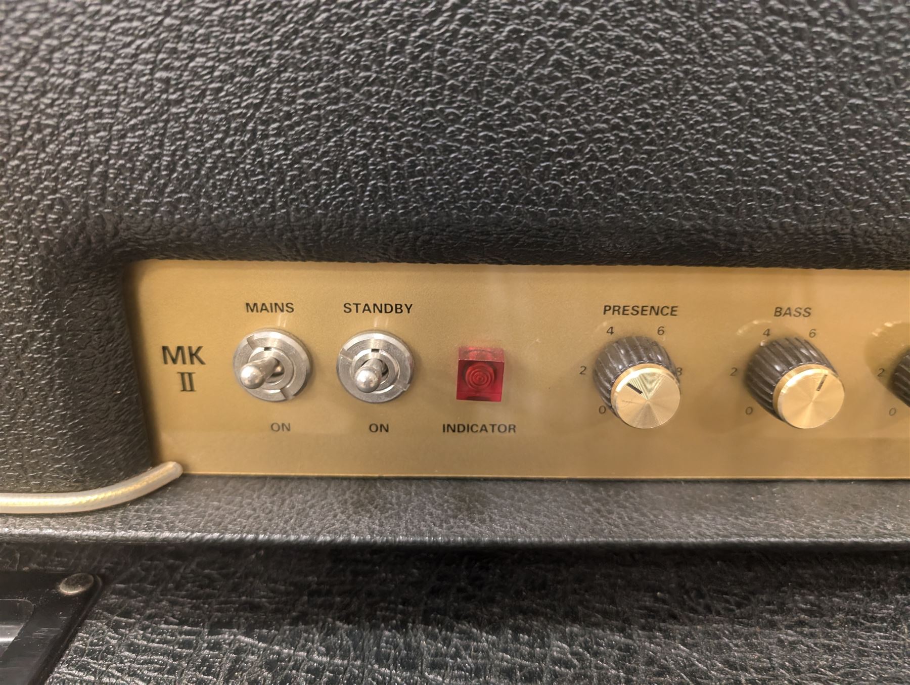 Marshall 1987X 50 watt plexi guitar amplifier head with master volume modification (screwdriver control on back), together with a Marshall 1960 4 x 12 speaker cabinet on casters, head H25cm, W65cm, cab H83cm, W76cm