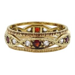 9ct gold red and clear stone set eternity ring, with pierced and textured band, London 1976