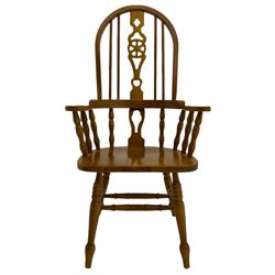 Hardwood Windsor armchair, hoop and stick back with pierced wheel splat, on turned supports with double H stretcher 