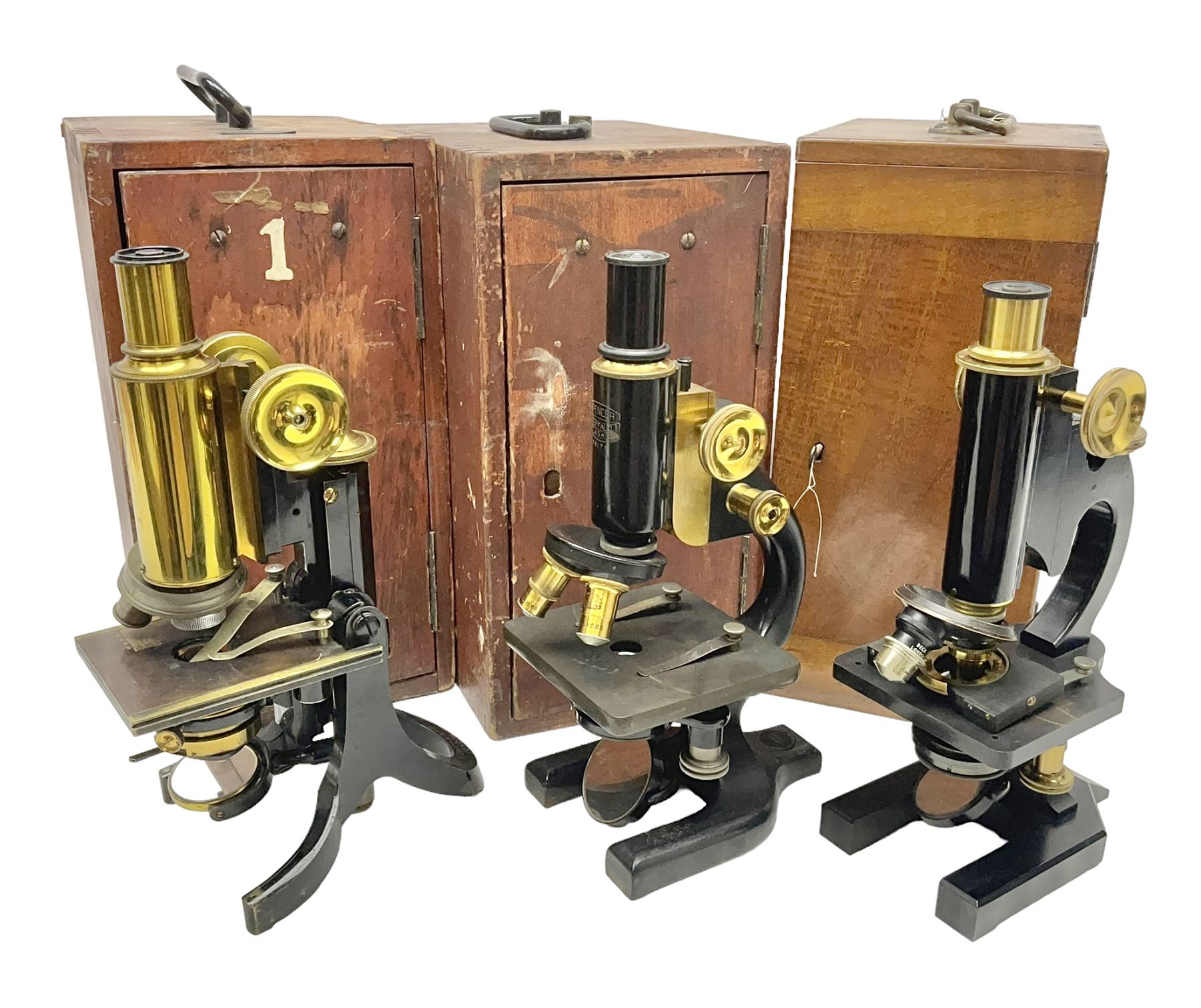 Three boxed microscopes, comprising Hawkslay & Sons Spencer Buffalo microscope no 68177, J Swift & Son microscope and R & J Back microscope no 30241