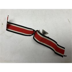 WW2 German Iron Cross 2nd Class with ribbon, ring stamped 44; and original issue packet; together with a copy of a WW2 Iron Cross