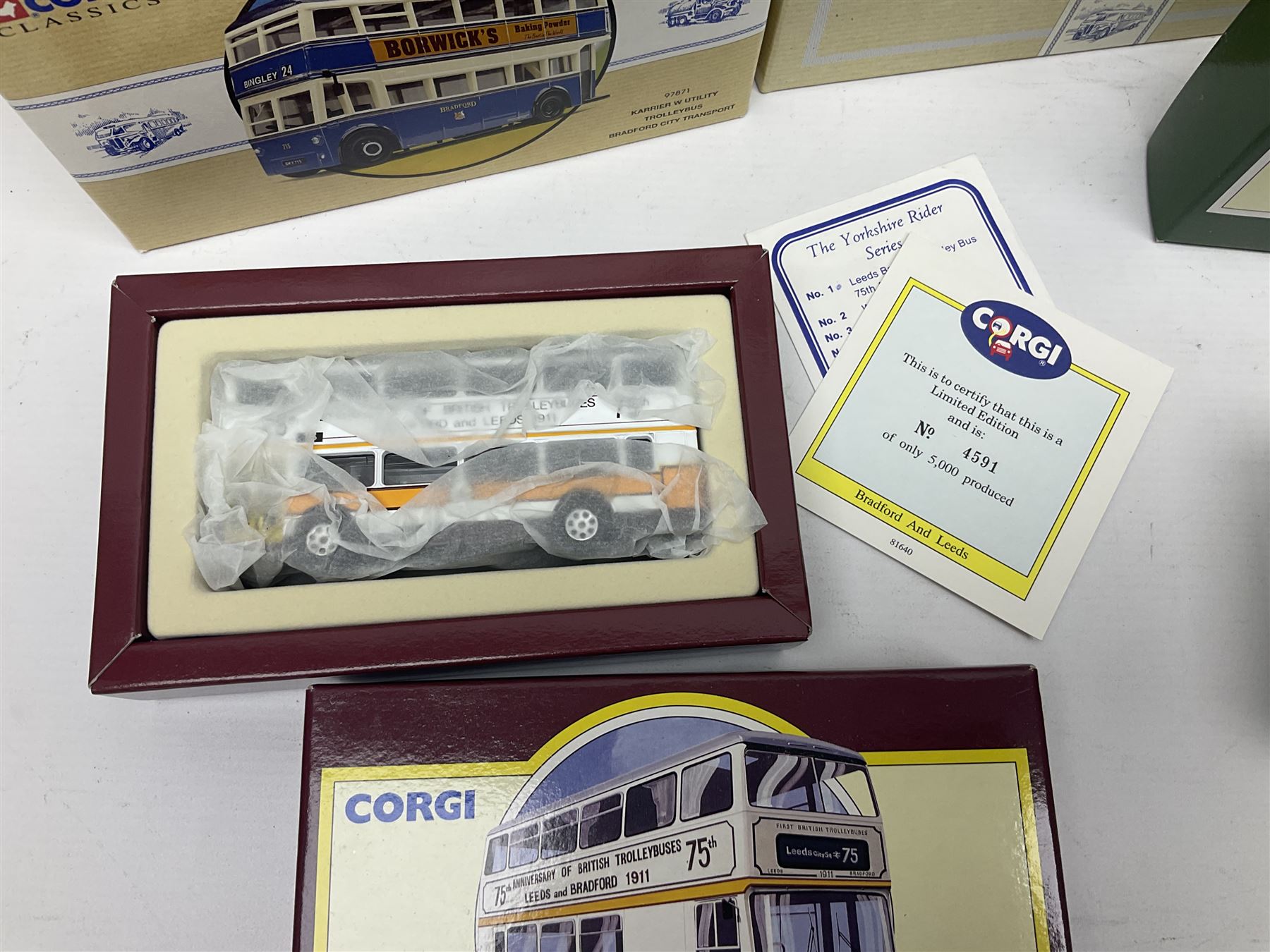 Corgi - twenty eight modern die-cast model coaches, buses and wagons to include Corgi Classics 35305, 96991, 97002, two 97108, 97208, 97267, 97335, 97871 and 98162; limited edition sets D949/26, 97107 and 97185; The Yorkshire Rider Series 91700, 91853, 91858 and 91862; all but one in original boxes or perspex display cases, most with certificates (27)