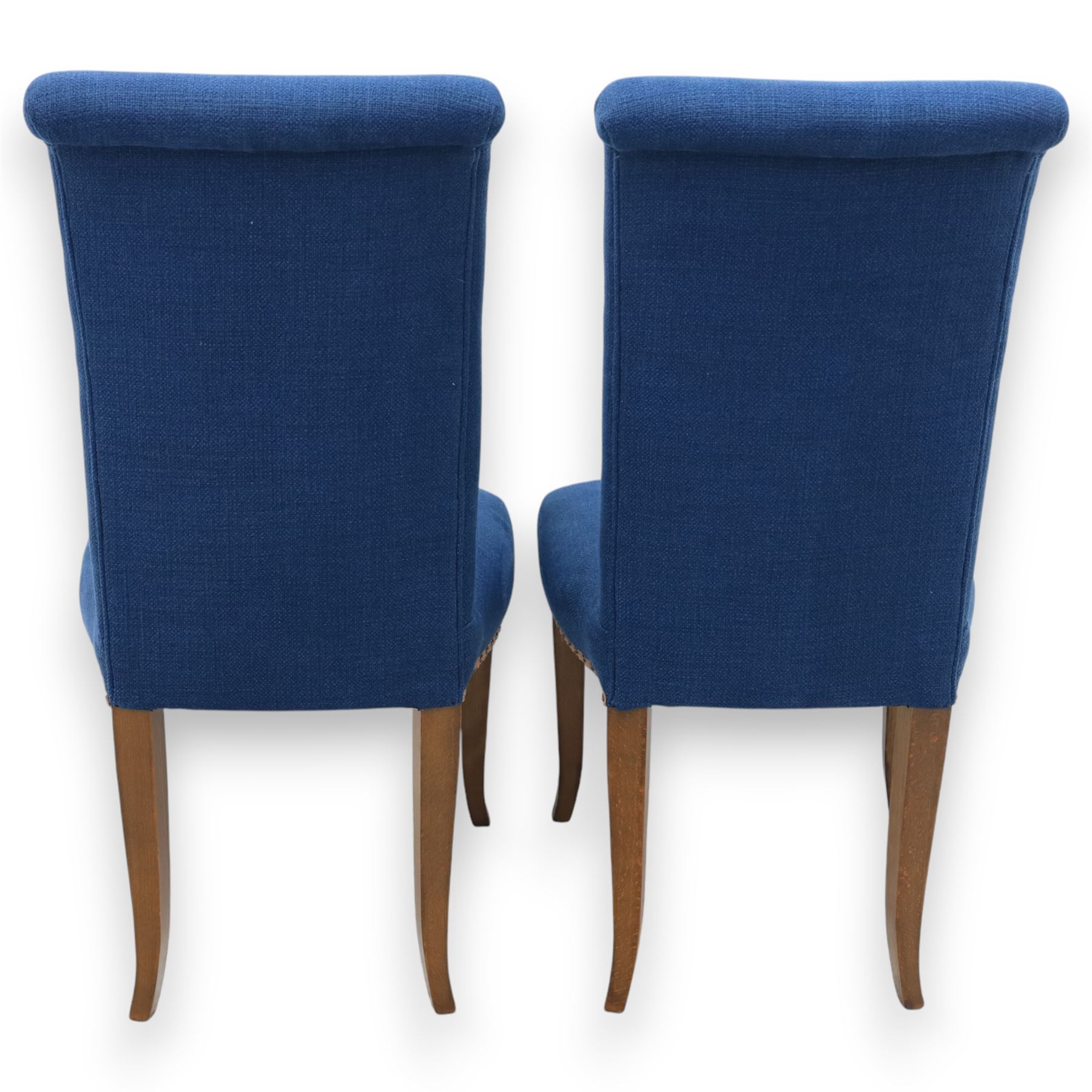 Contemporary set of four blue high back upholstered dining chairs