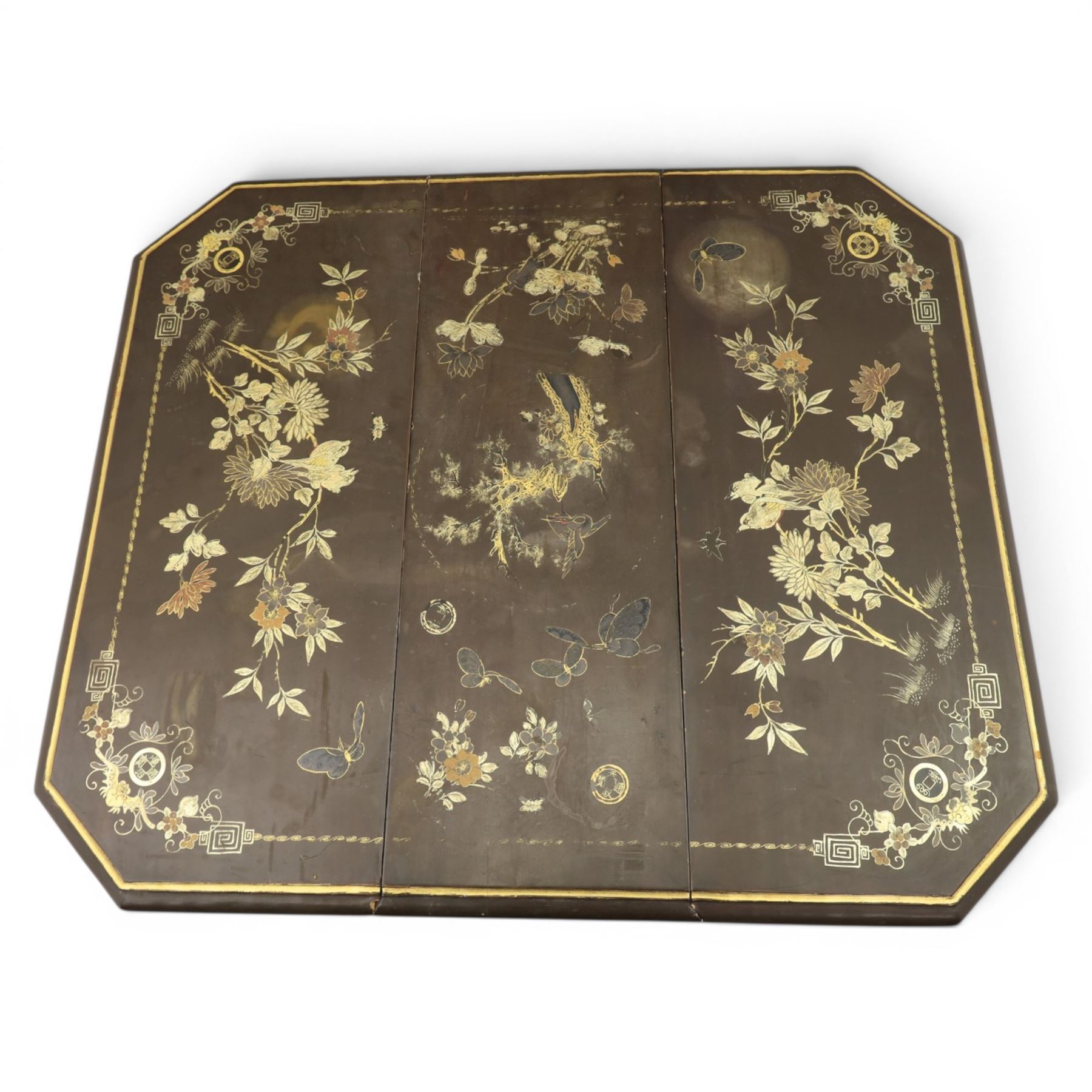 Chinoiserie style gate leg table, with gilt painted floral design, raised on bobbing supports, on sled feet