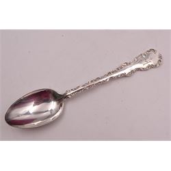 Set of ten Victorian silver coffee spoons, each with shaped scroll design rim, and a matching pair of sugar tongs, hallmarked Lee & Wigfull, Sheffield 1897, in tooled leather burgundy velvet and silk lined fitted case 