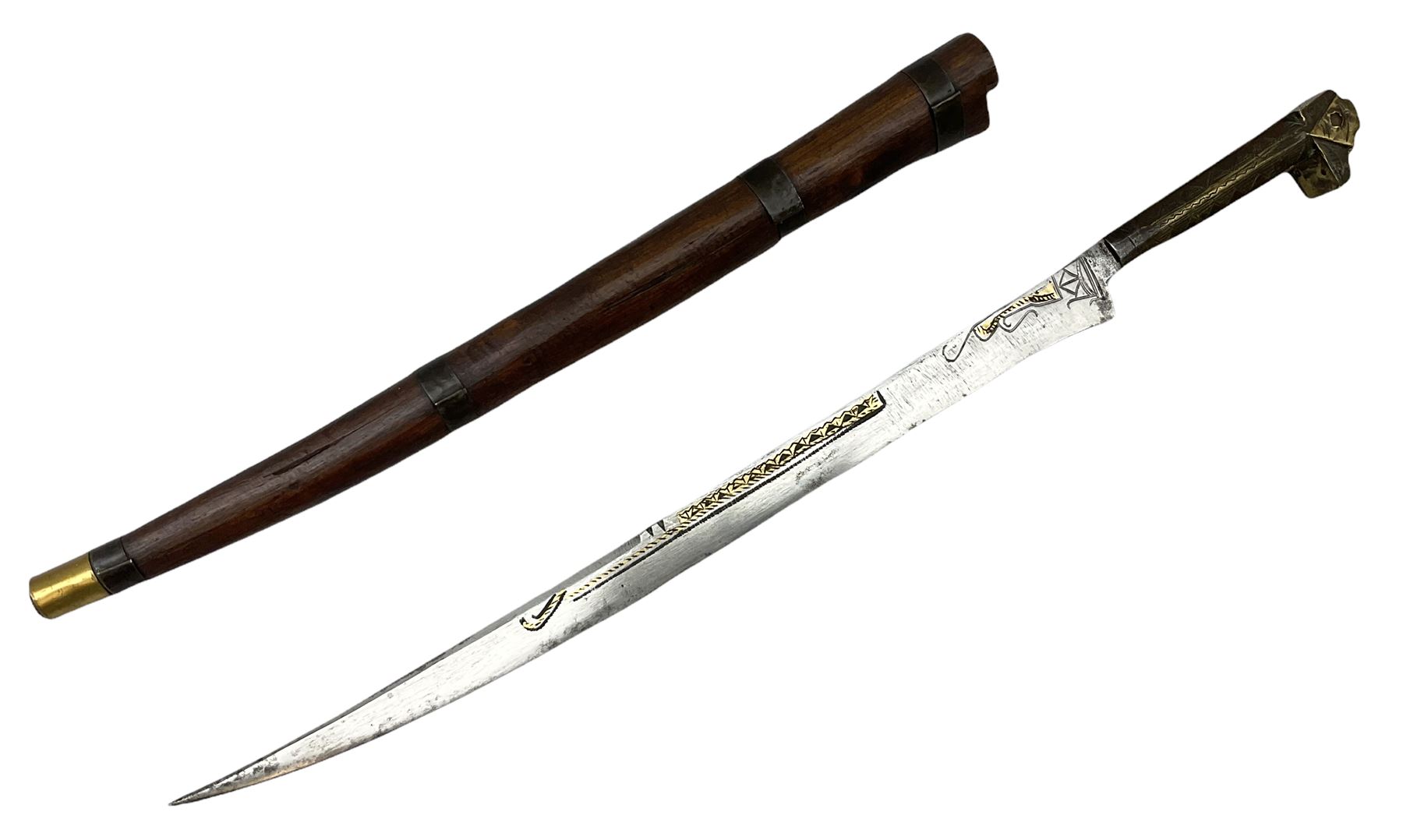 19th century Algerian Flyssa long knife, the 34cm single edged pointed decorative blade inset with yellow metal, chased brass grip with pommel as the snout of a stylised animal and carved hardwood scabbard L45cm overall