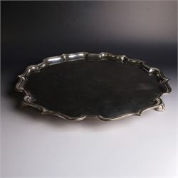 Mid 20th century silver tray, with shaped rim and upon three scroll feet, William Suckling Ltd, Birmingham 1946, D36cm