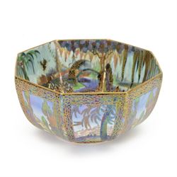 Early 20th century Wedgwood Fairland lustre bowl, circa 1920, of octagonal form, designed by Daisy Makeig-Jones, the exterior decorated in the Castle on the Road pattern, the interior decorated in the Fairy in a Cage pattern, pattern no Z5125, with printed marks beneath, H11cm D22.5cm

