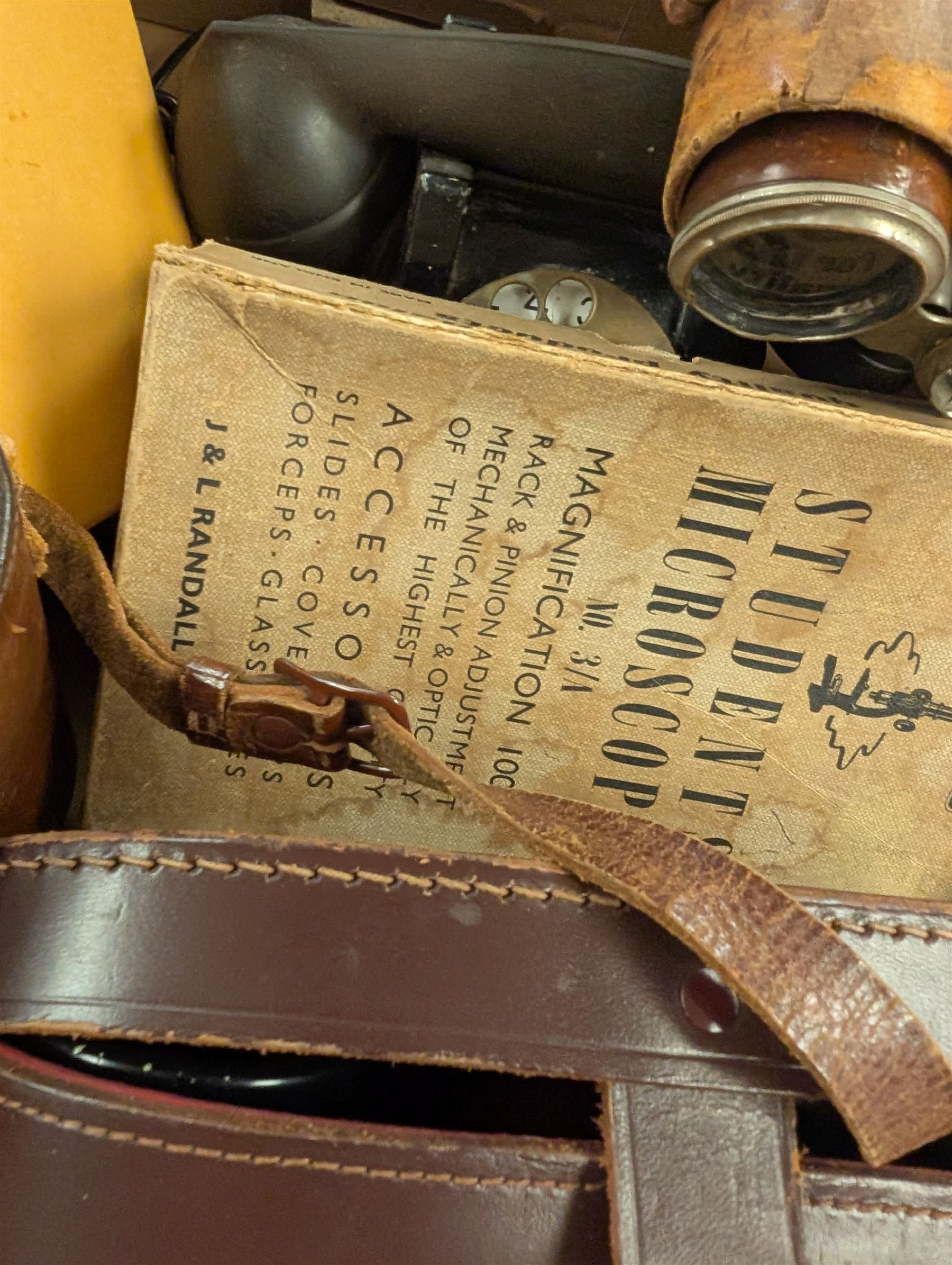 Collection of cameras and binoculars, including Kodak Retinette IB, Carl Zeiss Silvarem binoculars, student microscope, etc