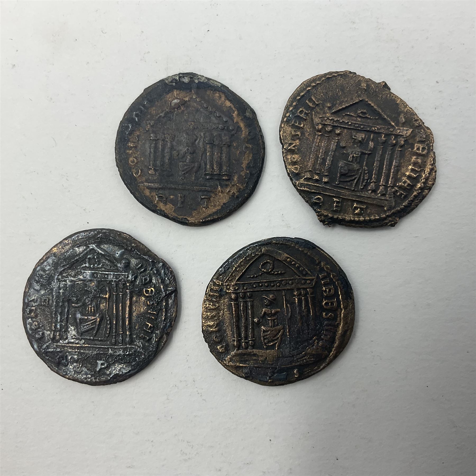 Roman Imperial Coinage, Maxentius (AD 306-312), fourteen bronze folles, most bearing rev. Roma seated in temple holding globe and sceptre (14)