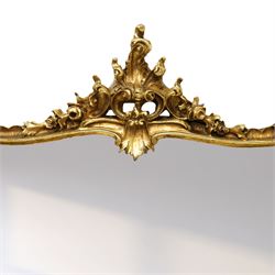 Contemporary Rococo revival style gilt overmantel mirror, shaped rectangular mirror plate with scrolling acanthus and rocaille frame, sides with inset Wedgwood style portrait plaques 