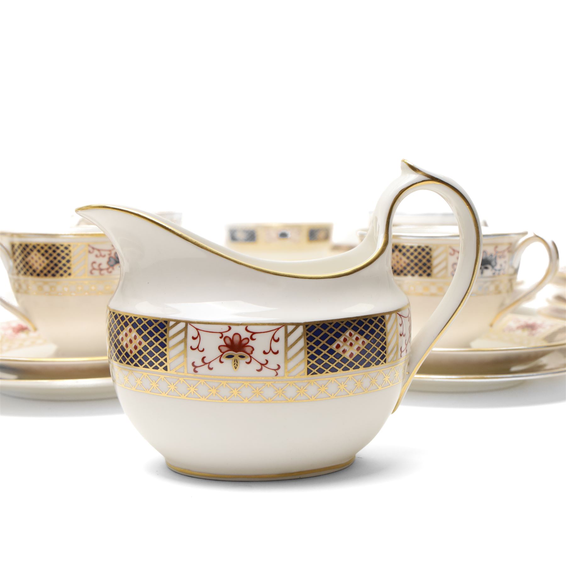 Royal Crown Derby 'Derby Border' pattern part tea service, comprising twelve teacups and saucers, twelve side plates, sandwich plate, milk jug and sugar bowl