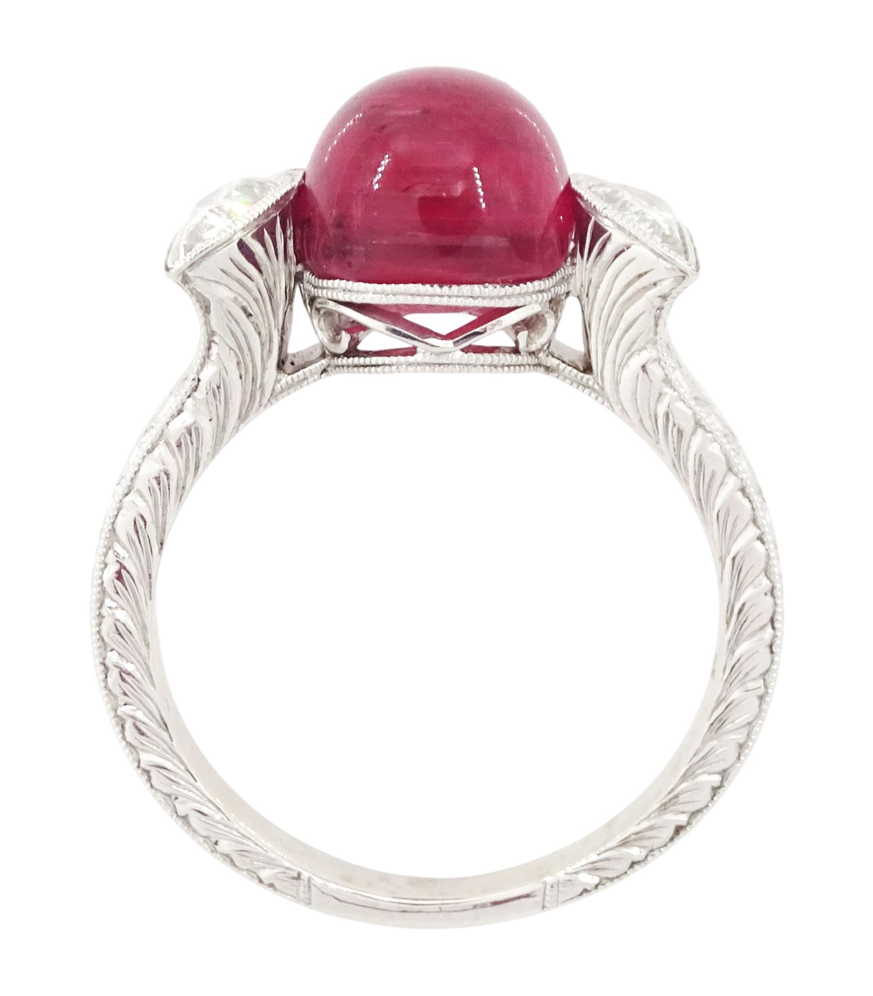 18ct white gold pink tourmaline and diamond ring, single oval cabochon cut tourmaline of approx 4.75 carat, set with a half moon cut diamond either side, to engraved laurel leaf design shoulders