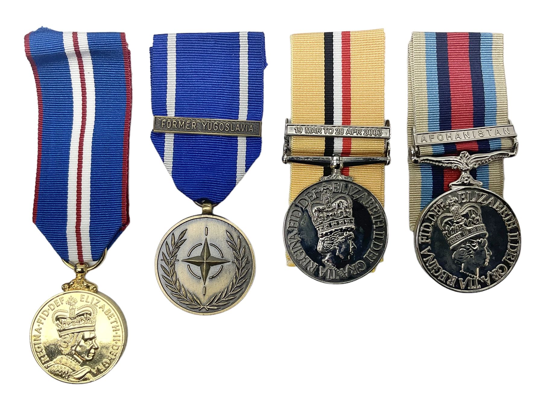 NATO Service Medal with clasp for Former Yugoslavia; together with three copy medals - Iraq Medal with clasp for 19 Mar to 28 Apr 2003 and unfitted rosette; Operational Service Medal with Afghanistan clasp; and QEII Golden Jubilee 2002 medal; all with ribbons (4)
