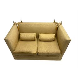 Edwardian knole design drop-arm two seat sofa, upholstered in yellow damask fabric with sprung back and seat and matching bolster cushions