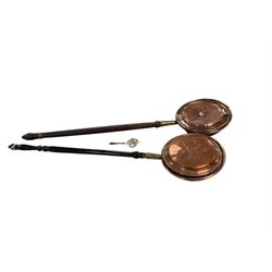 Two copper warming pans with silver strainer