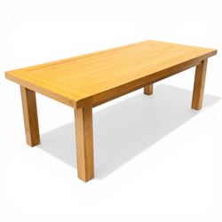 Late 20th century solid light oak dining table, on square supports
