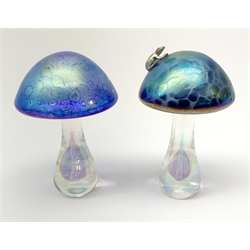 A John Ditchfield Glasform mushroom, in irridescent blue surmounted with a frog, H10.5cm, together with another similar John Ditchfield example. 