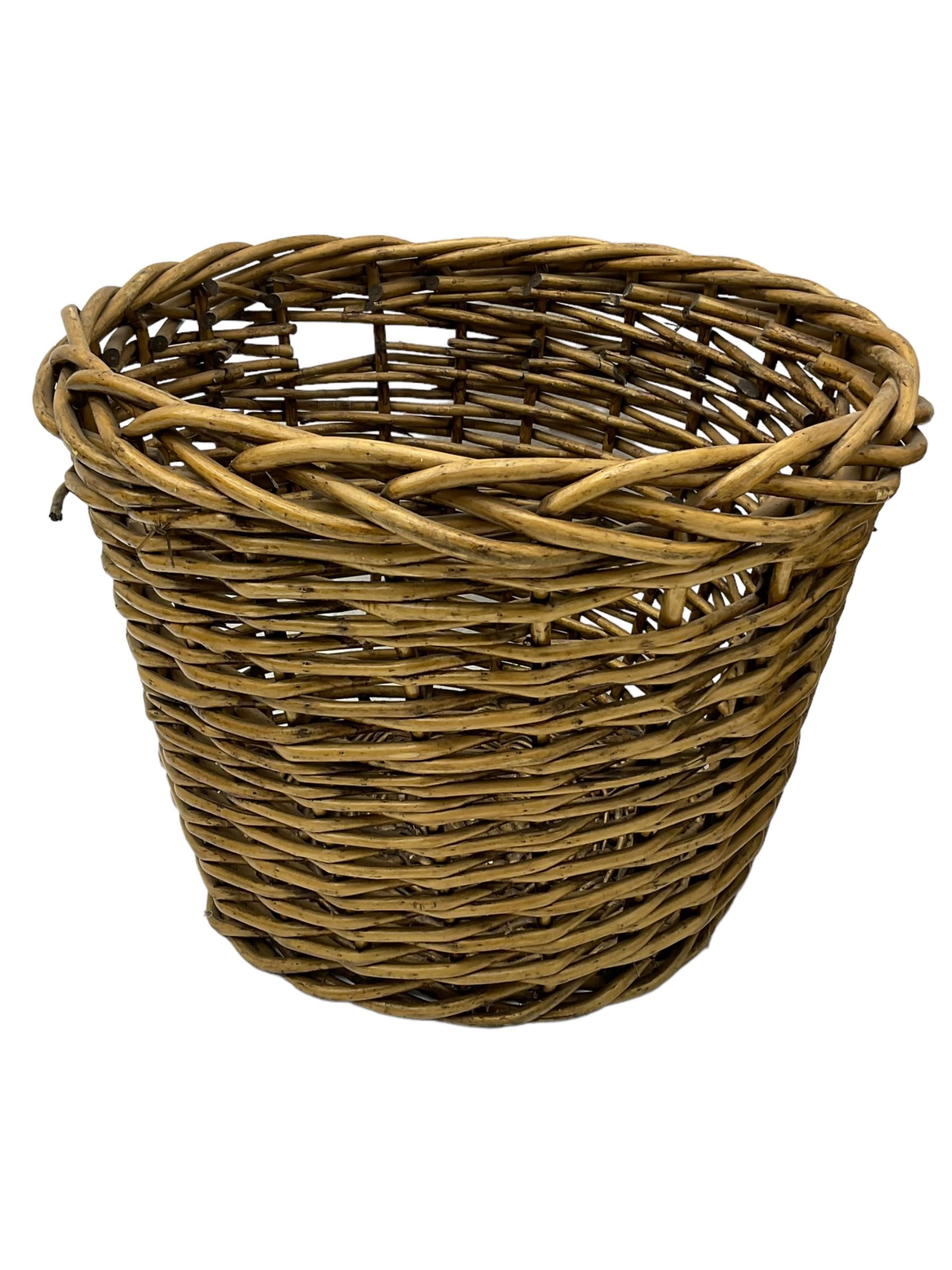 Three graduating wicker baskets (the largest - D55cm, H40cm)