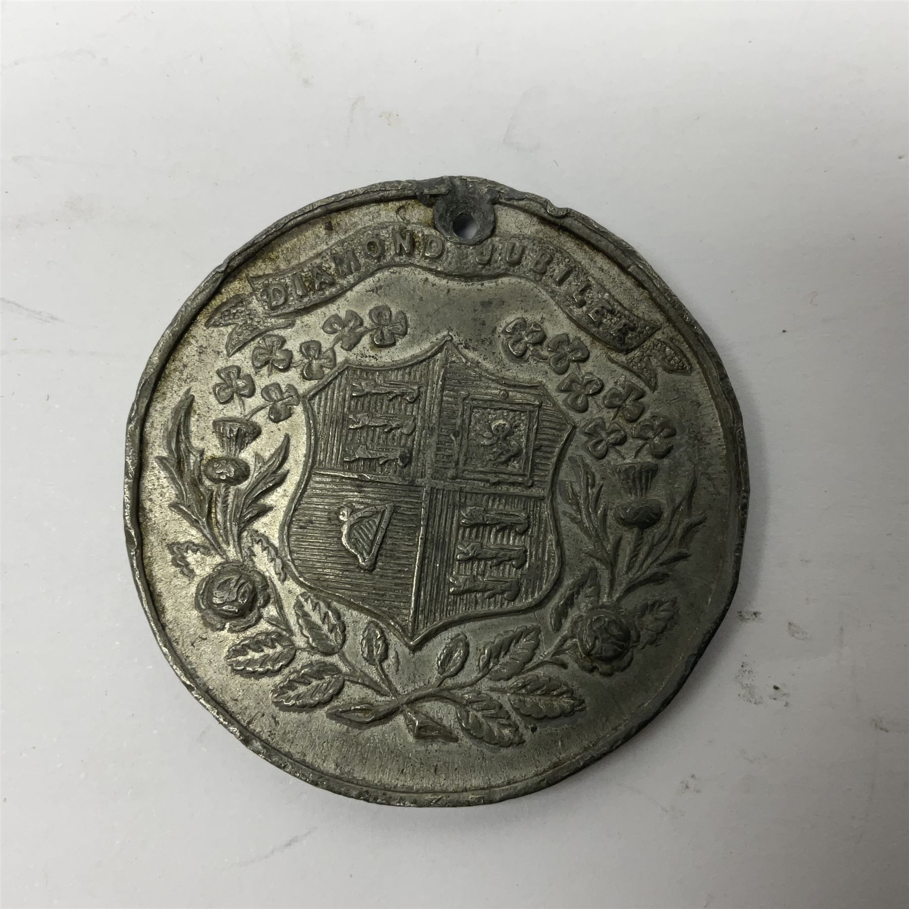 WWI pair of medals comprising Mercantile Marine medal and British War medal, awarded to Dominic L Kelly; both with ribbons and part original packaging and a Victoria Diamond Jubilee medallion.