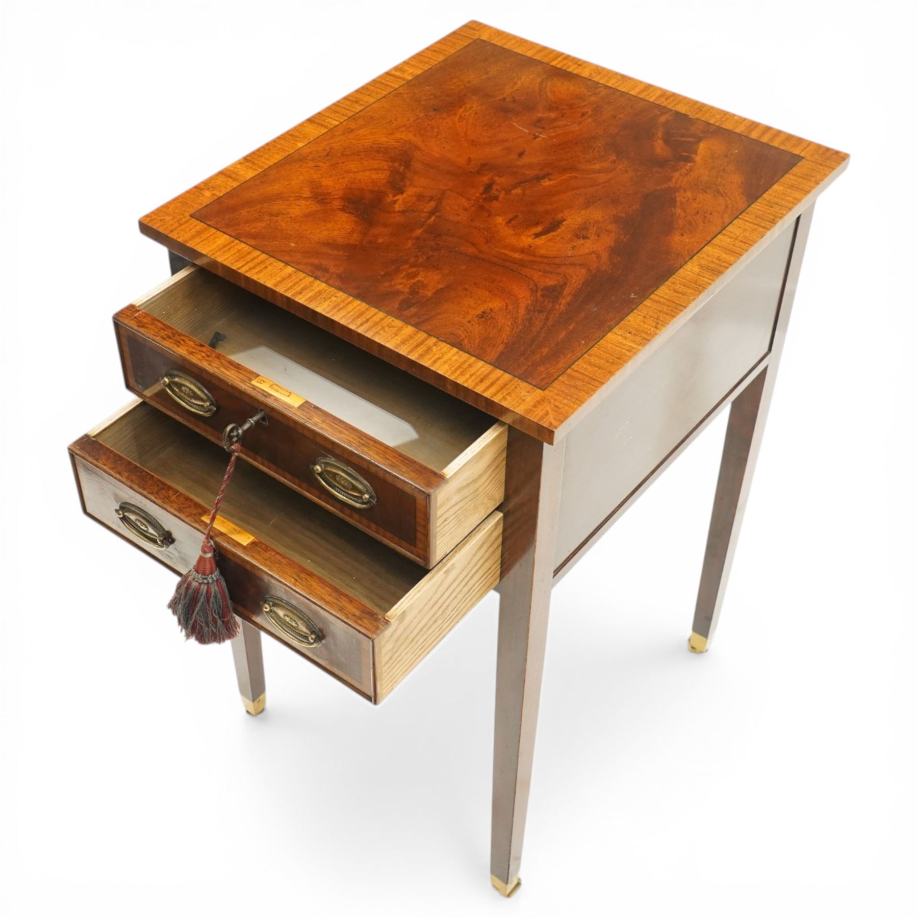 Georgian design inlaid mahogany collectors table, rectangular cross-banded top, fitted with two cock-beaded display drawers with interior glazed tops, with opposing faux drawers, fitted with pressed brass handle plates, on square tapering supports with castors, with keys
