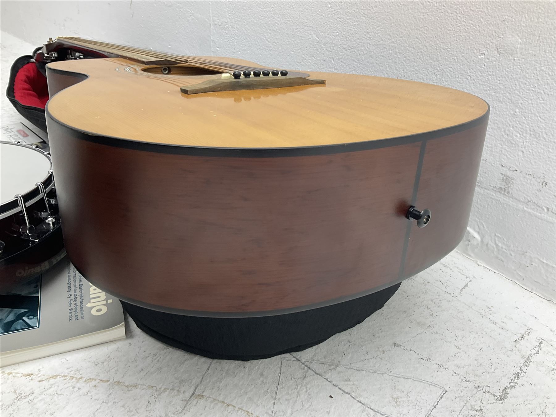 Rally five-string banjo with mahogany solid back L101cm in soft carrying case; and Brunswick Model BF200 acoustic guitar L103cm; with small quantity of instructional DVDs and booklets
